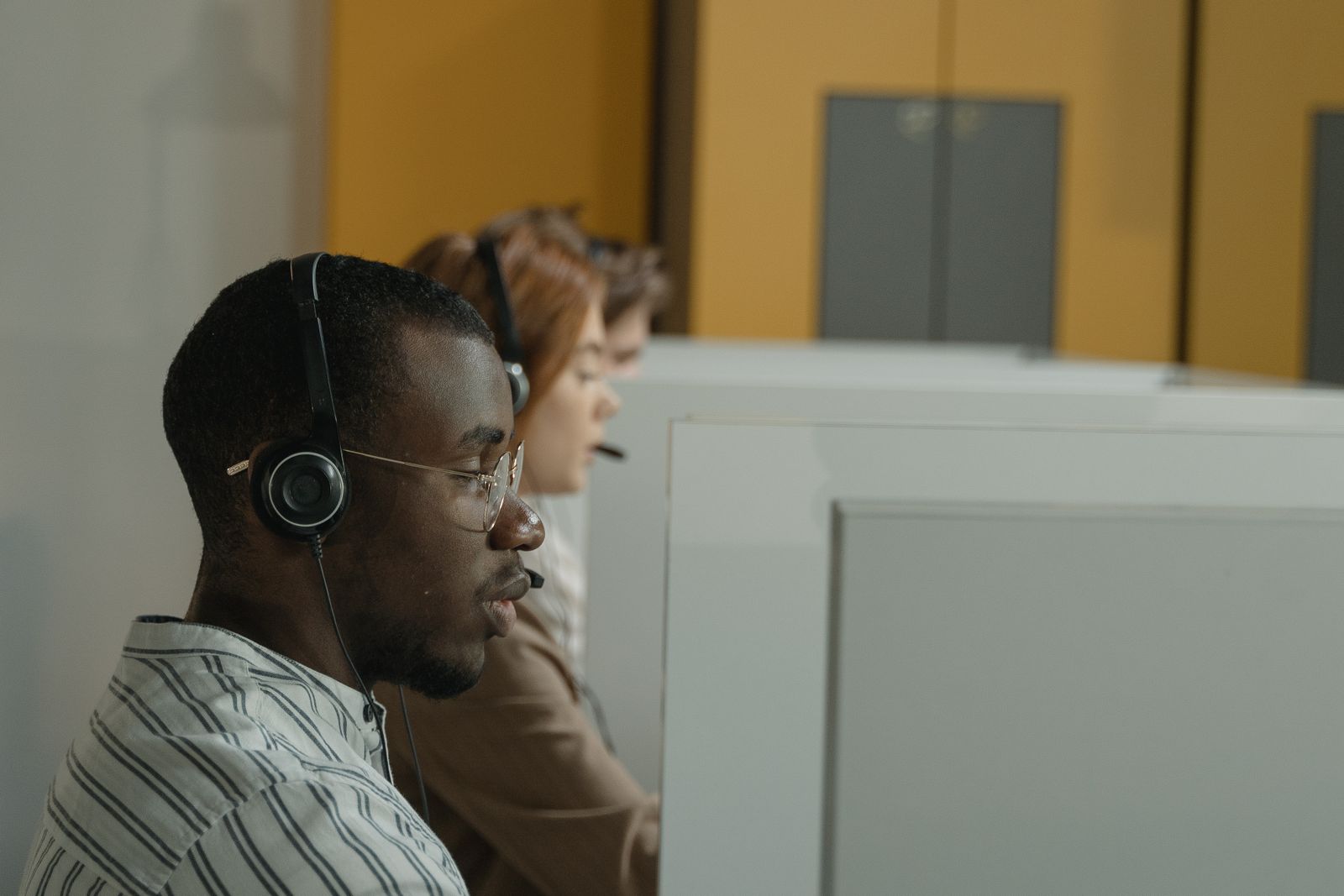 MTS support team collaborating in a modern office
